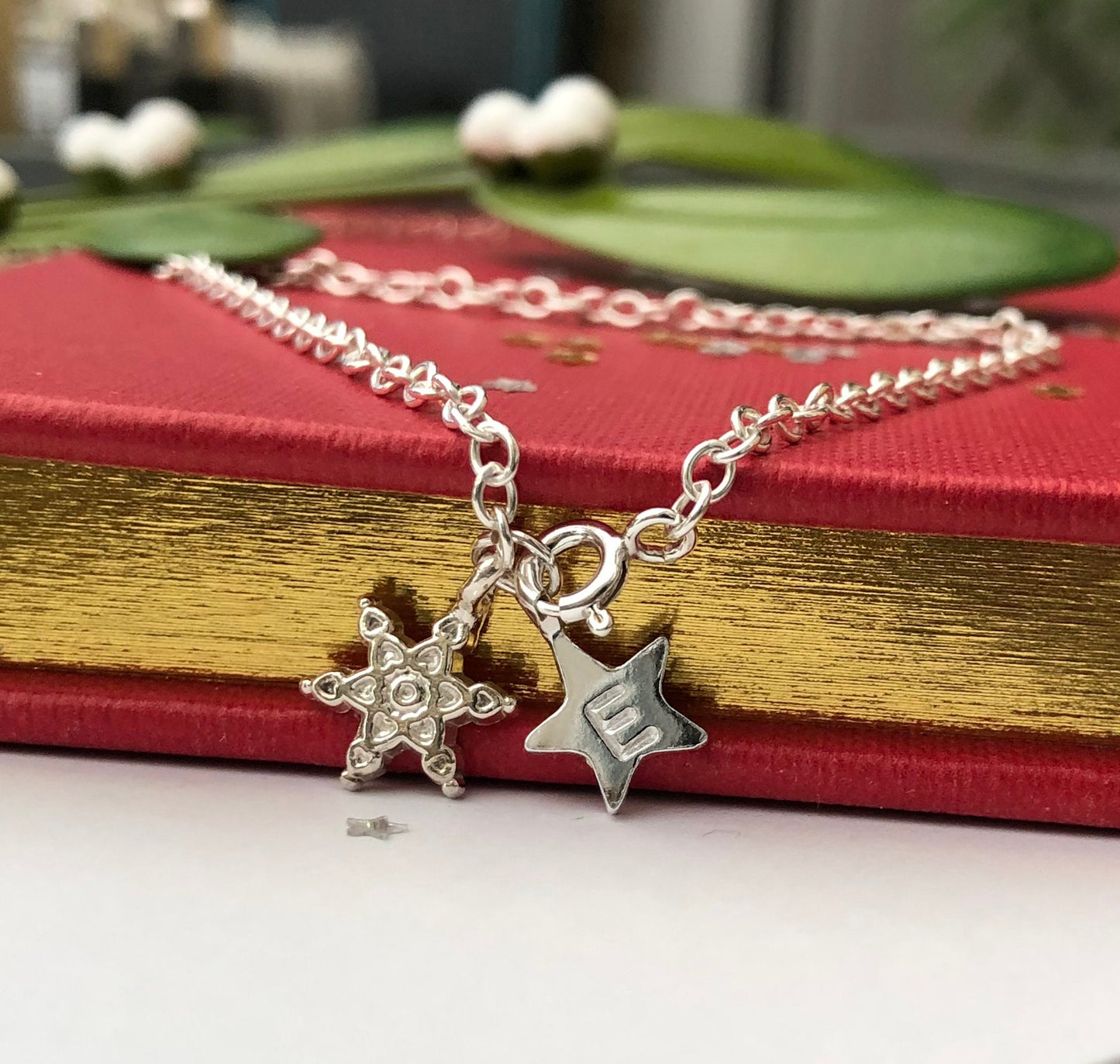 sterling silver snowflake and initial star bracelet