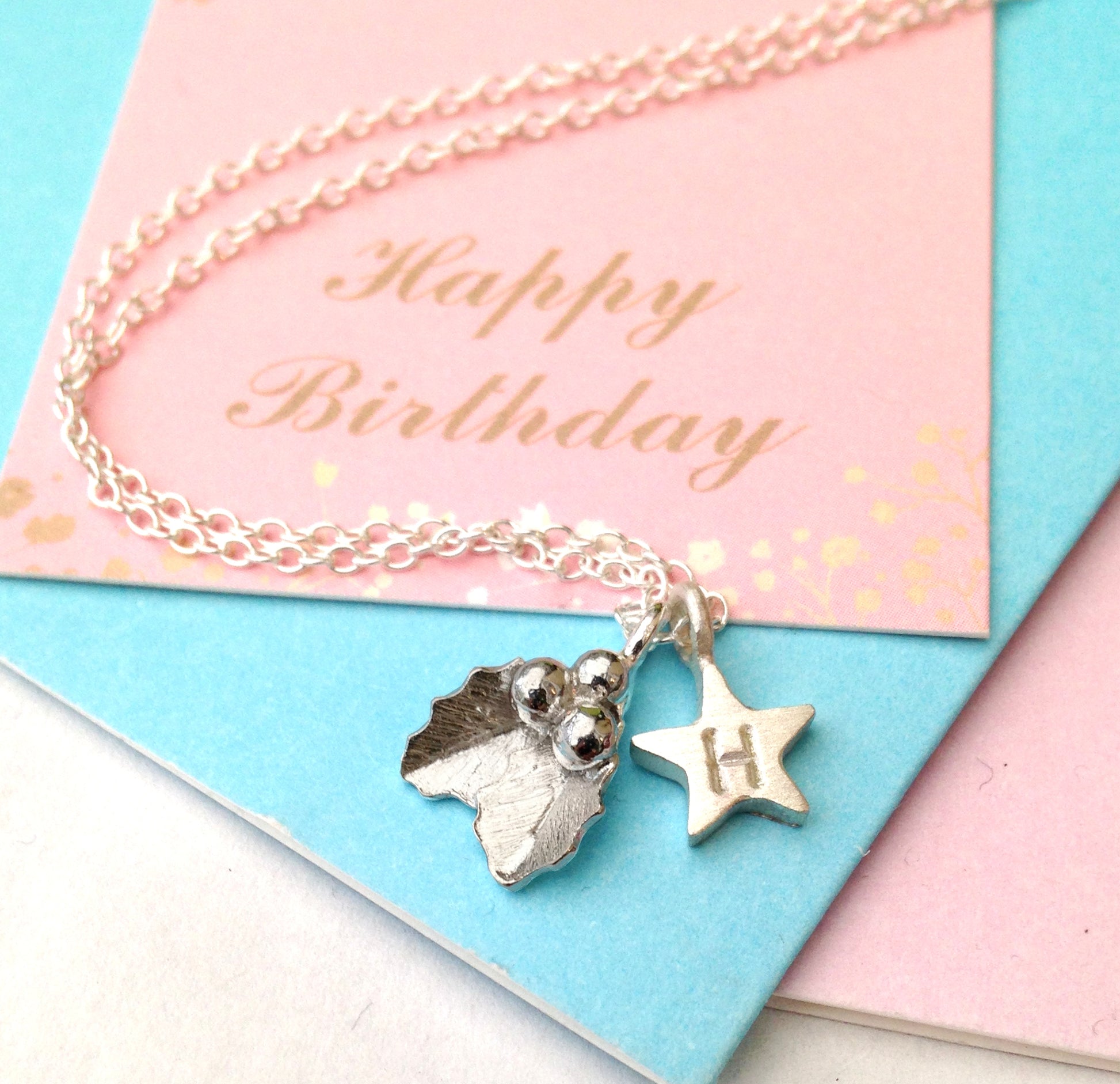 Personalised Small Holly And Initial Star Sterling Silver Necklace happy birthday gift card