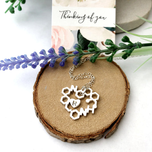 personalised love chemistry necklace with initial heart 