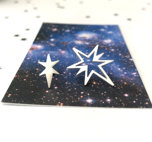 mismatched northern star earrings