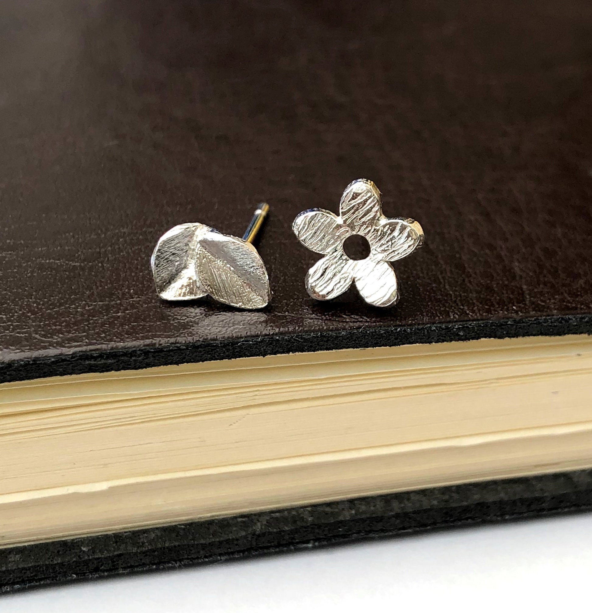 mismatched flower and leaf earrings