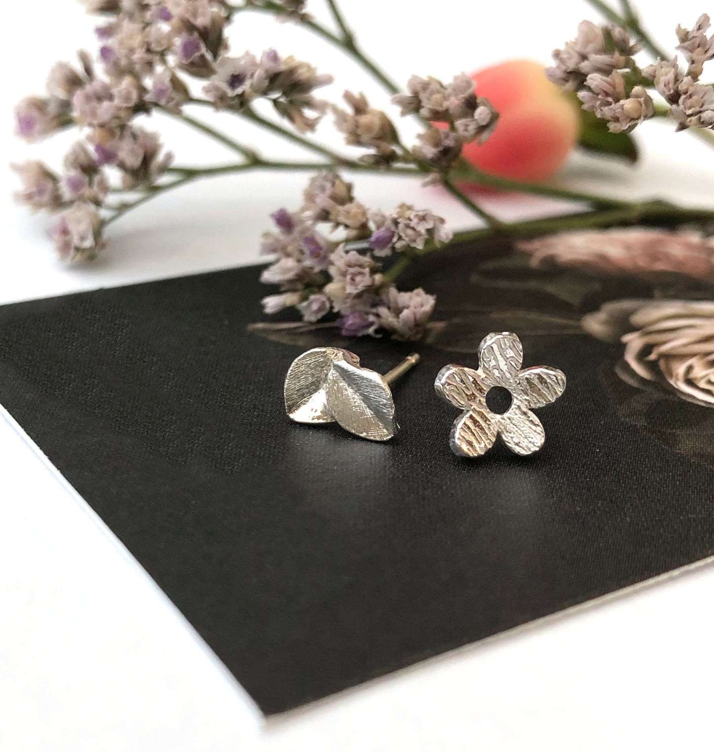 sterling silver mismatched flower and leaf stud earrings 